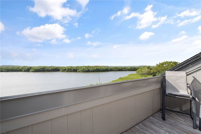 balcony featuring a water view