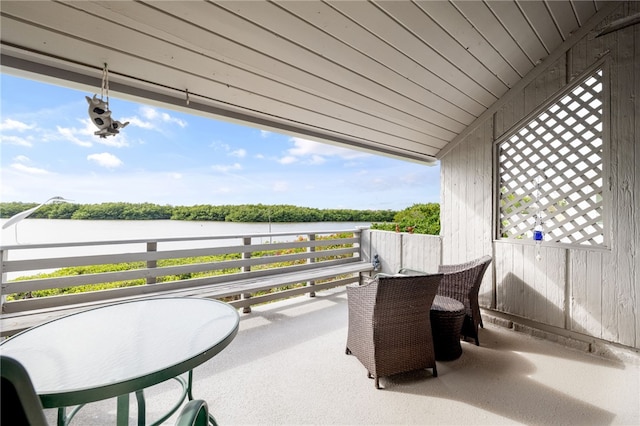 view of patio featuring a water view