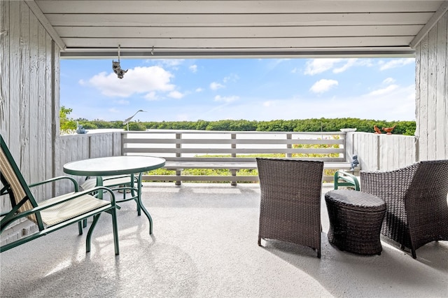 view of patio / terrace with a balcony