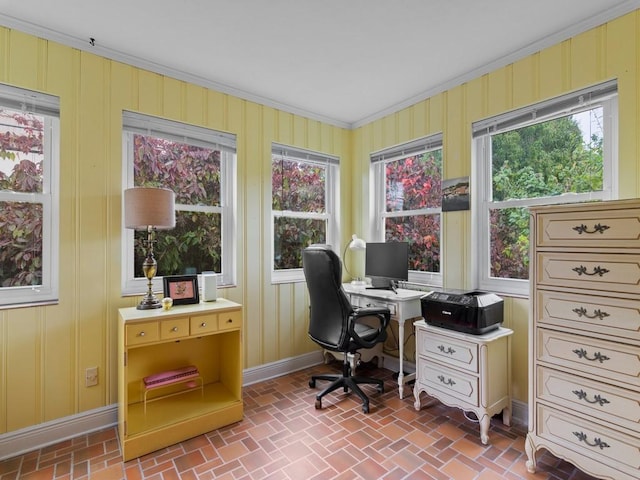 2237 10th Ave, Vero Beach, FL 32960 - office with brick floor, baseboards, a wealth of natural light, and crown molding