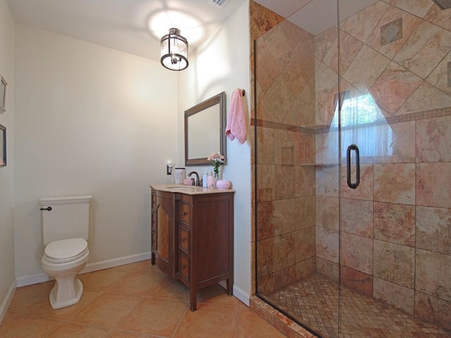 2237 10th Ave, Vero Beach, FL 32960 - bathroom featuring tile patterned floors, toilet, a stall shower, baseboards, and vanity