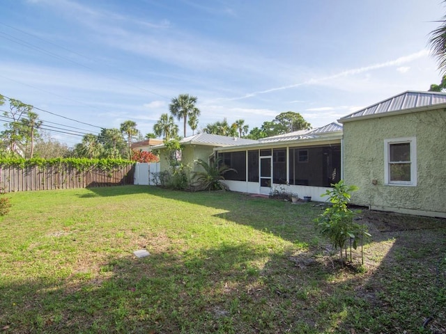 2237 10th Ave, Vero Beach, FL 32960 - view of yard with fence and a sunroom