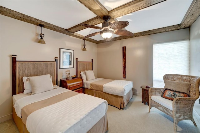 bedroom with ceiling fan, light carpet, and coffered ceiling