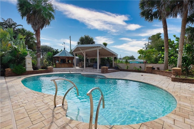 view of pool featuring a gazebo and a patio