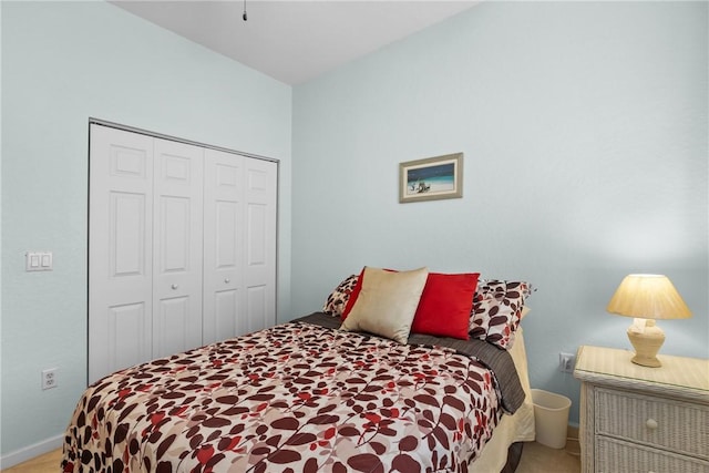 bedroom with carpet floors and a closet