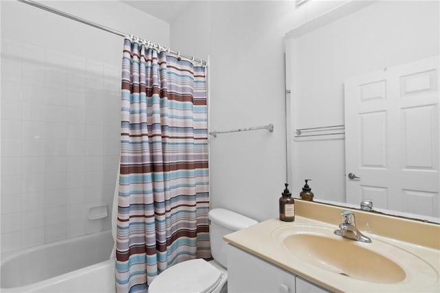 full bath featuring shower / bath combination with curtain, vanity, and toilet