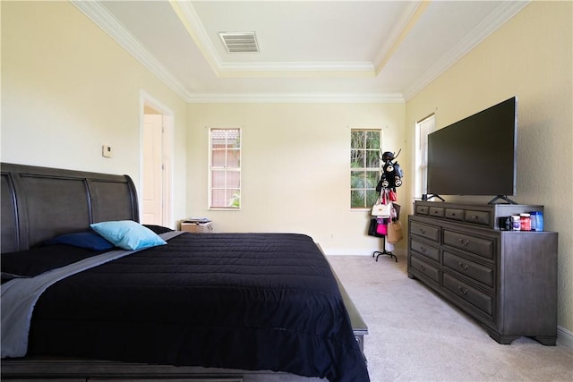 6139 57th Ct, Vero Beach, FL 32967 - bedroom with a tray ceiling, light colored carpet, ornamental molding, and baseboards