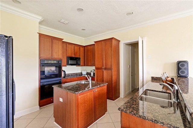 6139 57th Ct, Vero Beach, FL 32967 - kitchen featuring black appliances, a sink, dark stone counters, crown molding, and light tile patterned flooring