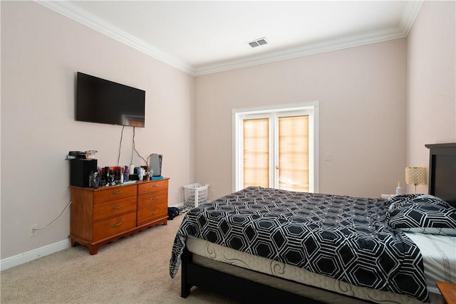 6139 57th Ct, Vero Beach, FL 32967 - bedroom featuring light colored carpet, crown molding, and baseboards