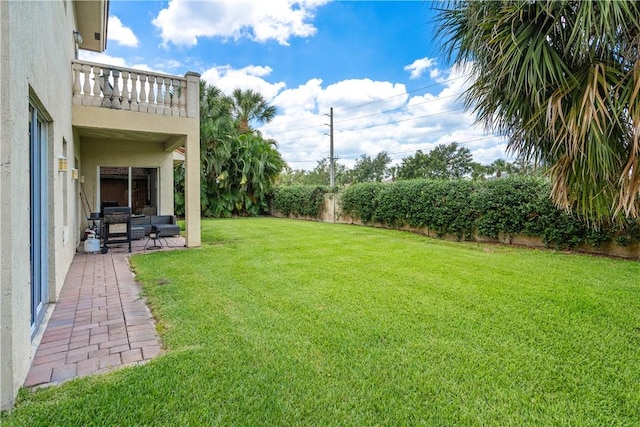 6139 57th Ct, Vero Beach, FL 32967 - view of yard featuring a balcony and a patio