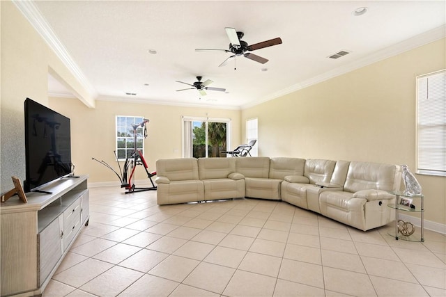 6139 57th Ct, Vero Beach, FL 32967 - living area featuring light tile patterned floors, crown molding, baseboards, and a ceiling fan