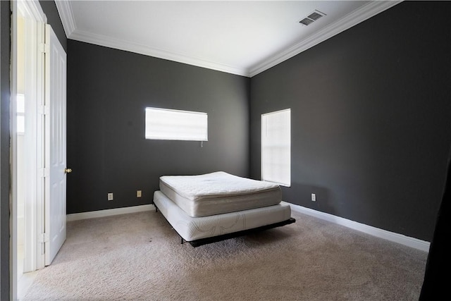 6139 57th Ct, Vero Beach, FL 32967 - carpeted bedroom with crown molding, baseboards, and multiple windows
