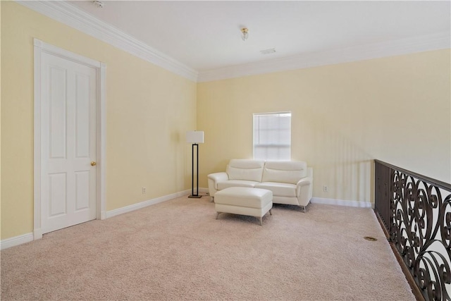 6139 57th Ct, Vero Beach, FL 32967 - sitting room featuring carpet, crown molding, and baseboards