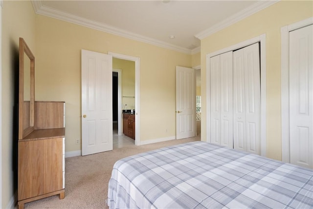 6139 57th Ct, Vero Beach, FL 32967 - bedroom with light carpet, ornamental molding, baseboards, and ensuite bath