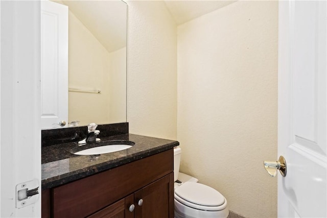 6139 57th Ct, Vero Beach, FL 32967 - bathroom with vanity and toilet
