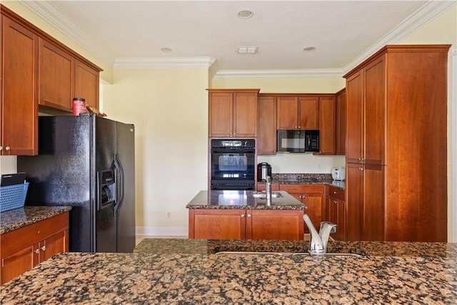 6139 57th Ct, Vero Beach, FL 32967 - kitchen featuring black appliances, a sink, dark stone counters, crown molding, and a kitchen island with sink