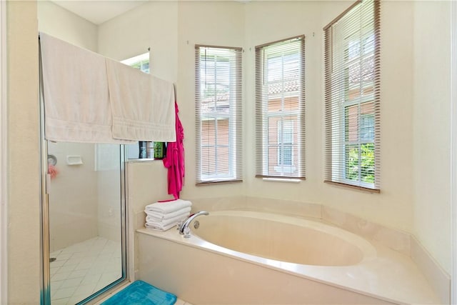 6139 57th Ct, Vero Beach, FL 32967 - full bath with a garden tub and a shower stall