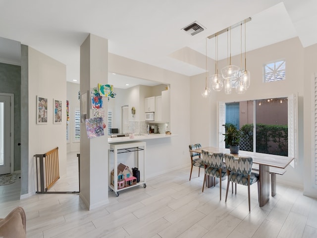 dining area with a chandelier