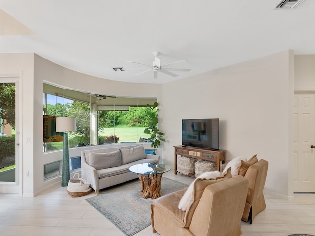 living room with ceiling fan