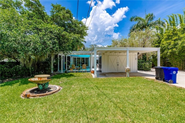 811 Royal Palm Pl, Vero Beach, FL 32960 - view of green lawn with a patio area