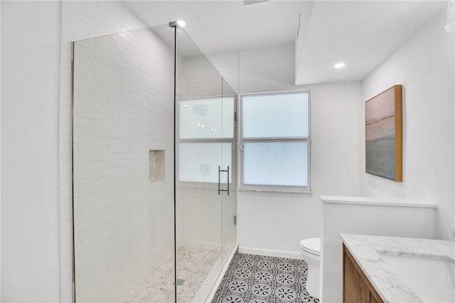 811 Royal Palm Pl, Vero Beach, FL 32960 - bathroom featuring a shower stall, vanity, tile patterned flooring, and recessed lighting