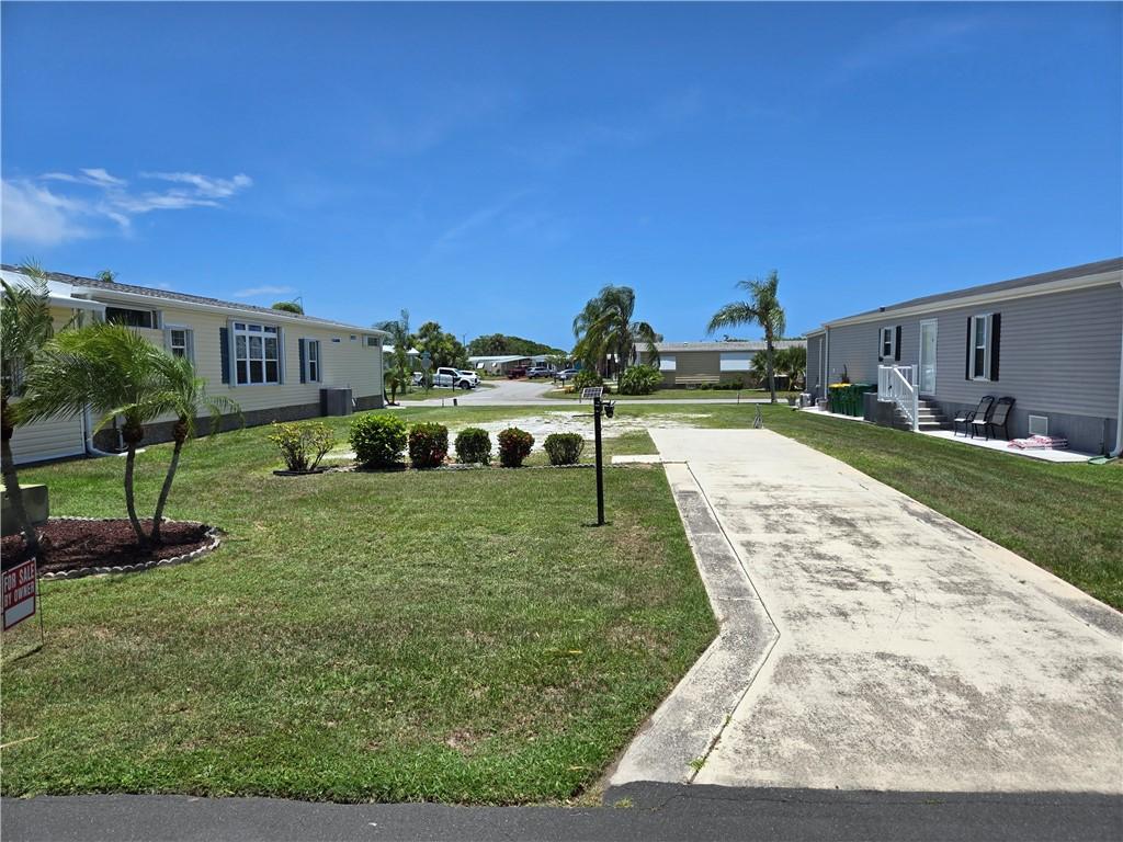 932 Fir St, Barefoot Bay, FL 32976
