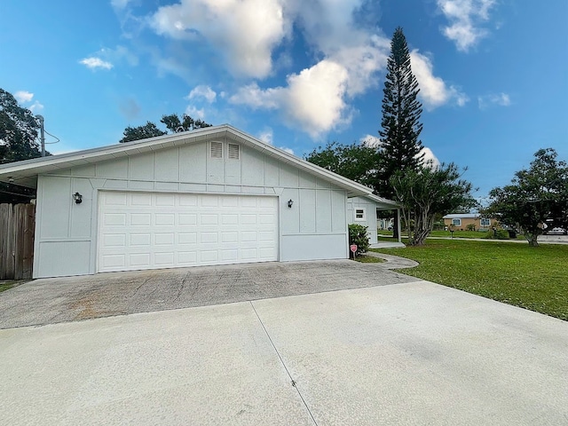 view of side of home featuring a lawn