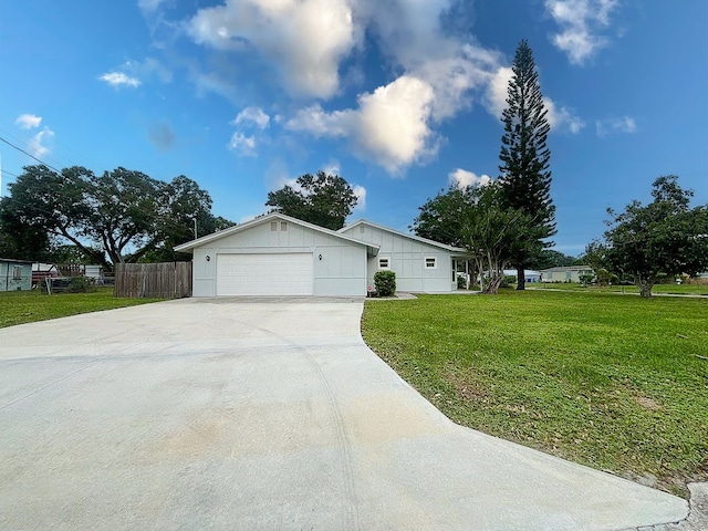 ranch-style house with a front lawn and a garage