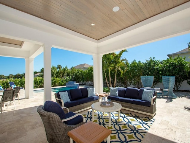 909 Surfsedge Way, Vero Beach, FL 32963 - view of patio with an outdoor hangout area and an outdoor pool