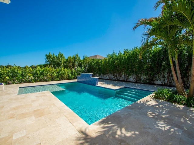 909 Surfsedge Way, Vero Beach, FL 32963 - swimming pool with a patio