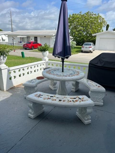 view of patio with a garage