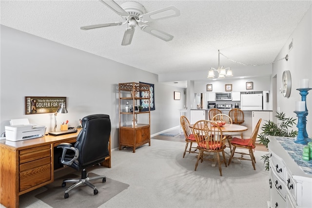 office featuring a textured ceiling, light colored carpet, and ceiling fan with notable chandelier