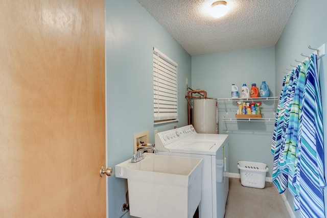 laundry room featuring sink, gas water heater, a textured ceiling, carpet, and washer and dryer