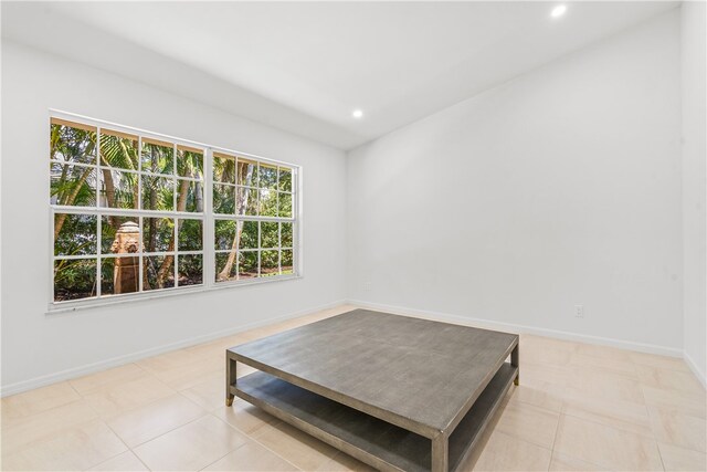 living area with light tile patterned floors