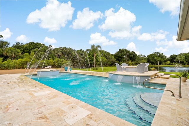 view of pool with a patio, a water view, pool water feature, and a hot tub