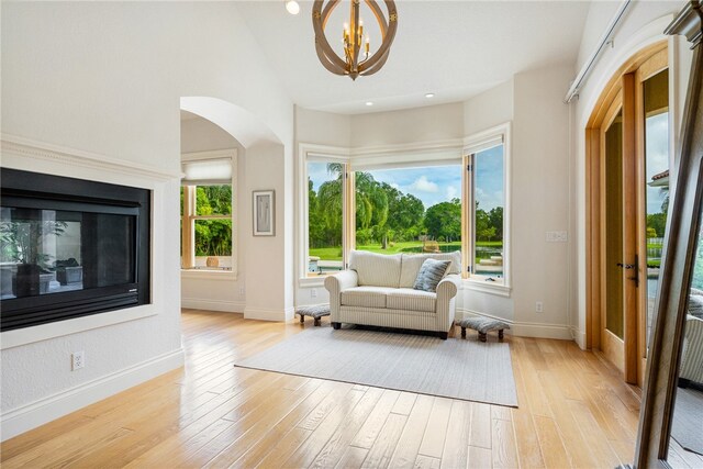 interior space featuring a notable chandelier and light hardwood / wood-style floors