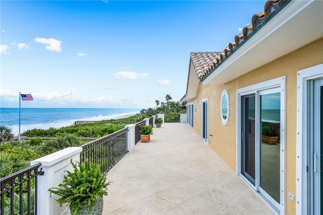 596 Ocean Rd, Vero Beach, FL 32963 - balcony featuring view of water and beach