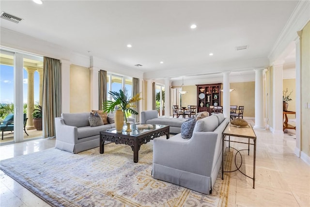 596 Ocean Rd, Vero Beach, FL 32963 - living room with decorative columns, crown molding, recessed lighting, and baseboards