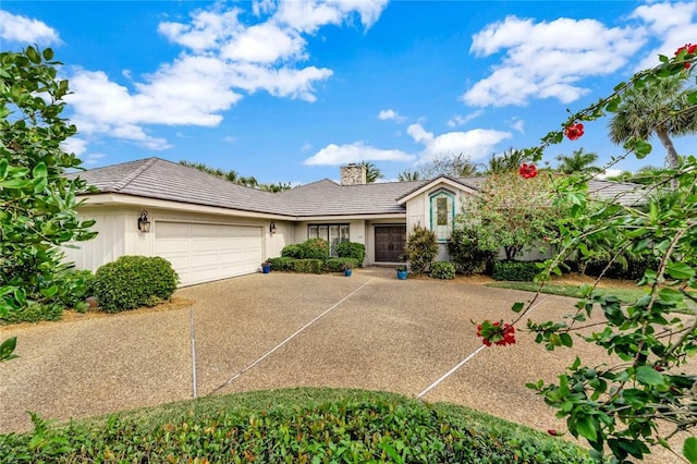 single story home with a garage