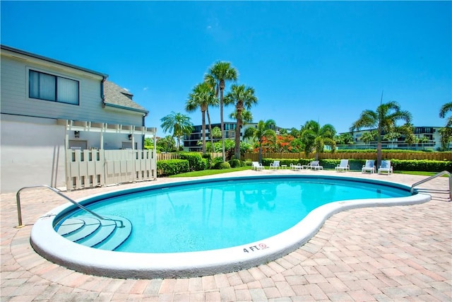 pool featuring fence