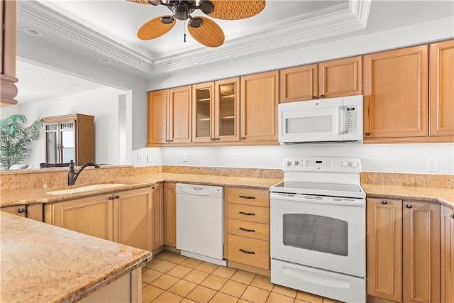 kitchen with ornamental molding, white appliances, a sink, and glass insert cabinets