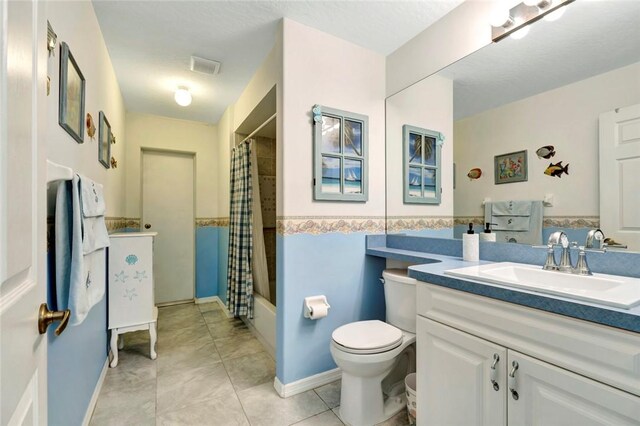 8145 95th Ct, Vero Beach, FL 32967 - full bathroom featuring tile patterned floors, shower / bathtub combination with curtain, toilet, vanity, and visible vents