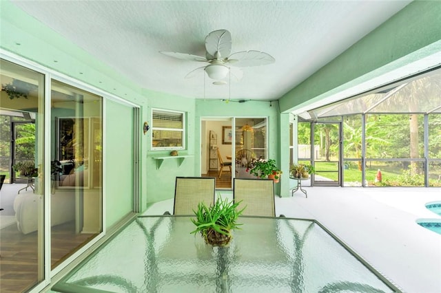 8145 95th Ct, Vero Beach, FL 32967 - sunroom with a wealth of natural light and a ceiling fan