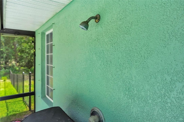 8145 95th Ct, Vero Beach, FL 32967 - exterior space with stucco siding and fence