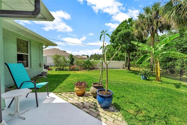 8145 95th Ct, Vero Beach, FL 32967 - view of yard with a patio and fence