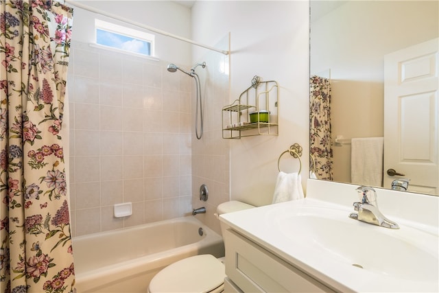 full bathroom featuring vanity, toilet, and shower / tub combo