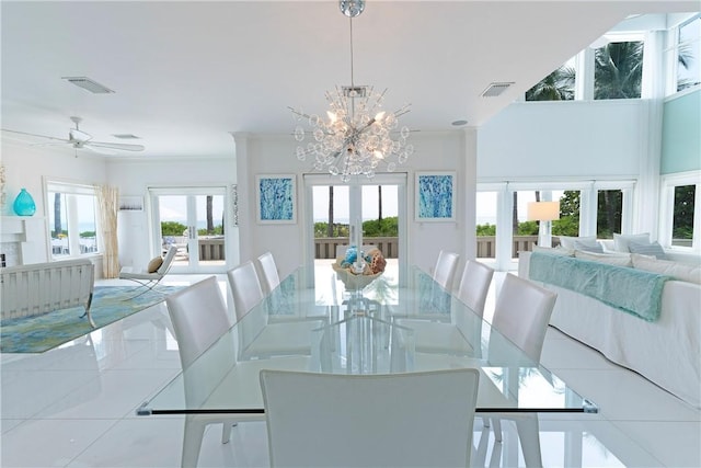116 Ocean Way, Vero Beach, FL 32963 - dining space with a chandelier, french doors, ceiling fan, and tile patterned flooring