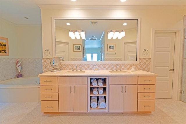 116 Ocean Way, Vero Beach, FL 32963 - full bathroom featuring crown molding, double vanity, a garden tub, tile patterned floors, and recessed lighting