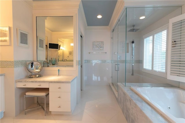 116 Ocean Way, Vero Beach, FL 32963 - bathroom featuring a stall shower, a whirlpool tub, vanity, tile patterned flooring, and crown molding