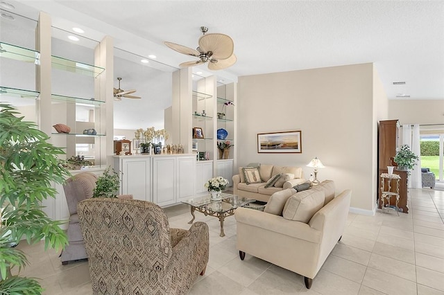 4951 Corsica Sq, Vero Beach, FL 32967 - living area featuring ceiling fan, light tile patterned floors, lofted ceiling, built in features, and recessed lighting